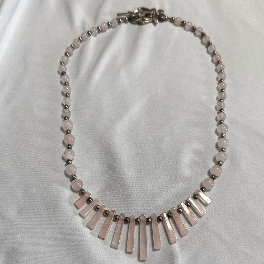 Pink stone necklace with flower closure